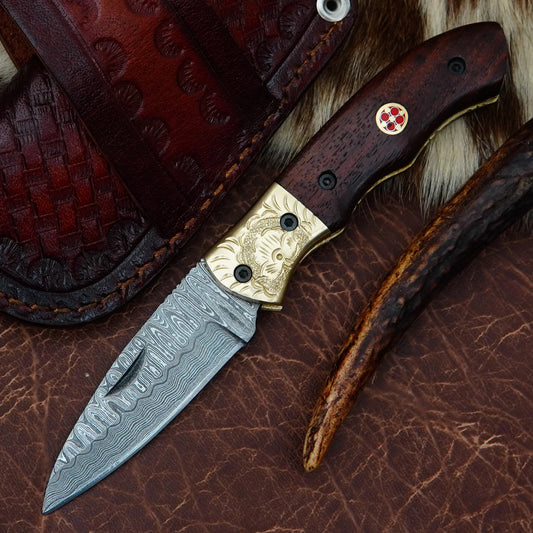 Damascus Drop Point Folding Pocket Knife – Natural Walnut Wood Handle with Engraved Brass Bolster & Mosaic Pin | Hand Forged 156 Layer CHFOL06